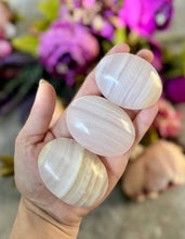 Load image into Gallery viewer, Pink Calcite Palm Stones, UV Reactive: 75-99 Grams