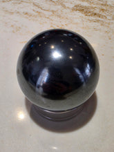 Load image into Gallery viewer, Hematite Sphere 2" Polished
